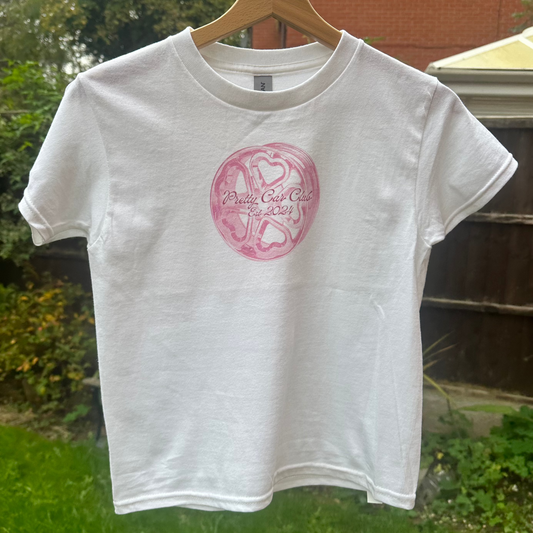 Pink car wheel tshirt on a pink background. Perfect tshirt for car girls. A Silk and Chrome tshirt.